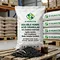 X-HUMATE Soluble Humic Acid Granular, 70% humics content, high-solubility soil conditioner, 25kg / 55lbs export-grade bag on wooden pallet, professional product photography with granule texture sample and water-solubility beaker test.